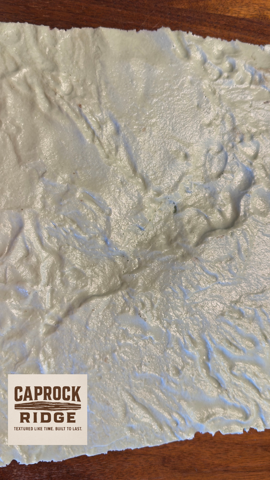Textured wall finish sample with 'Caprock Ridge' branding
