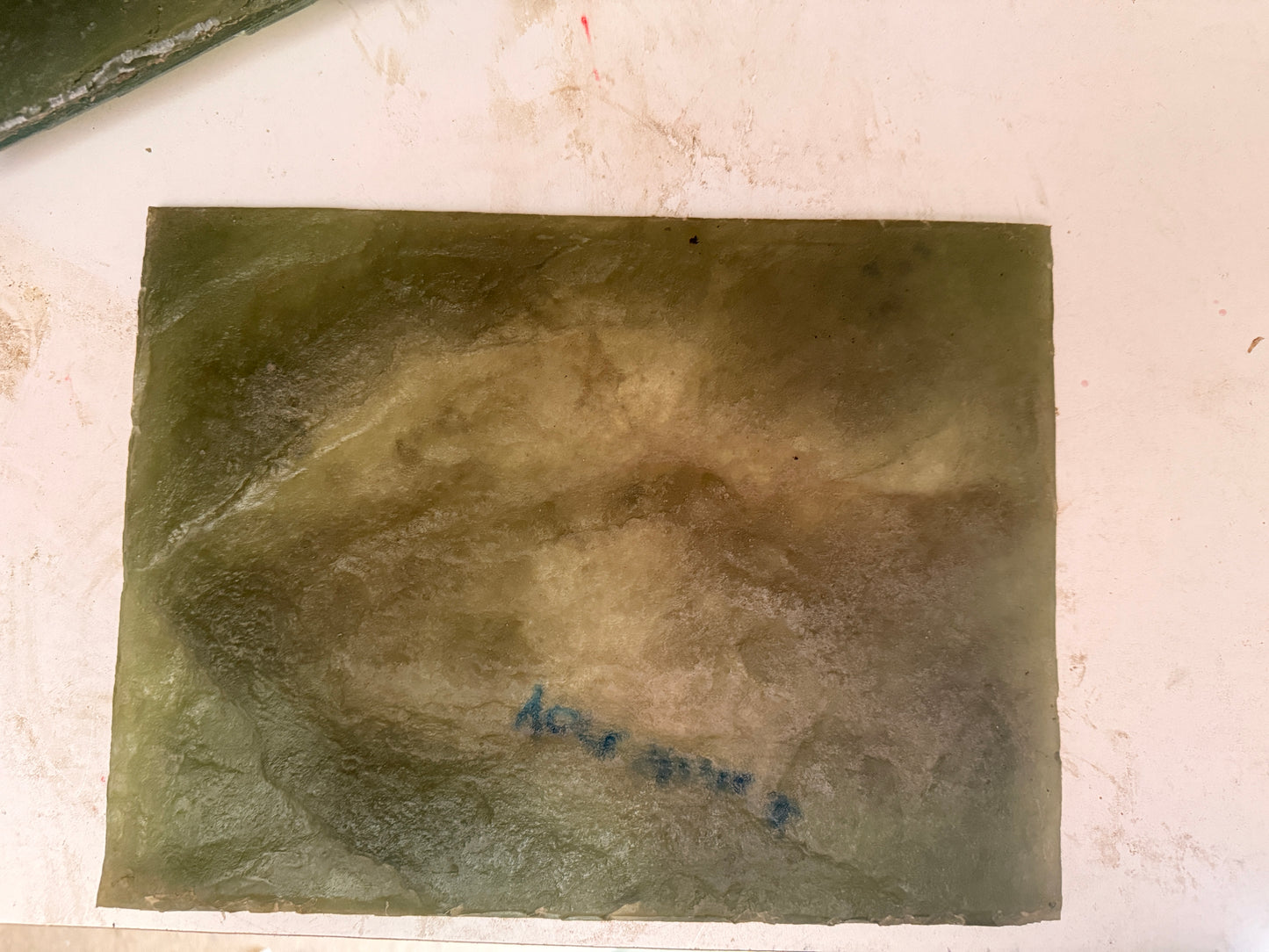 Green stone texture mat